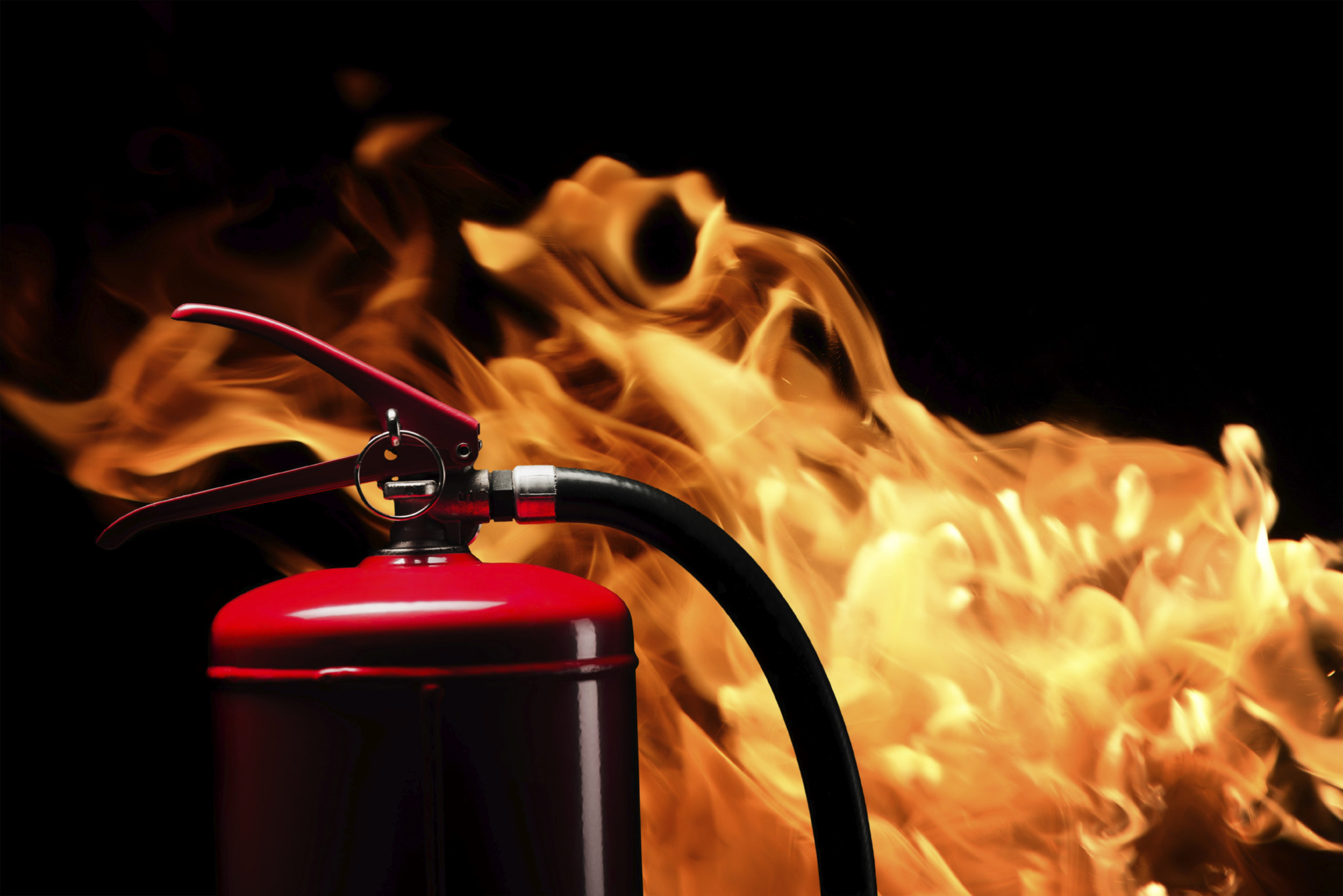 fire-extinguisher on flame background